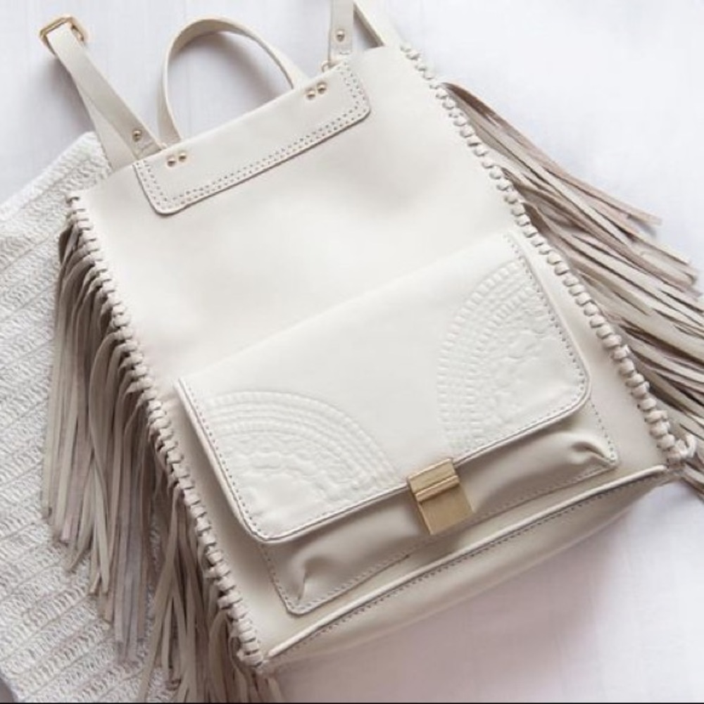 Sancia convertible leather embossed fringe backpack